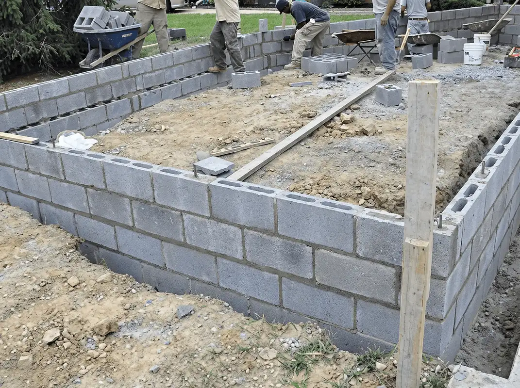 Professionals building a foundation with blocks in New Haven, CT