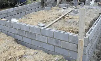 Professionals building a foundation with blocks in New Haven, CT